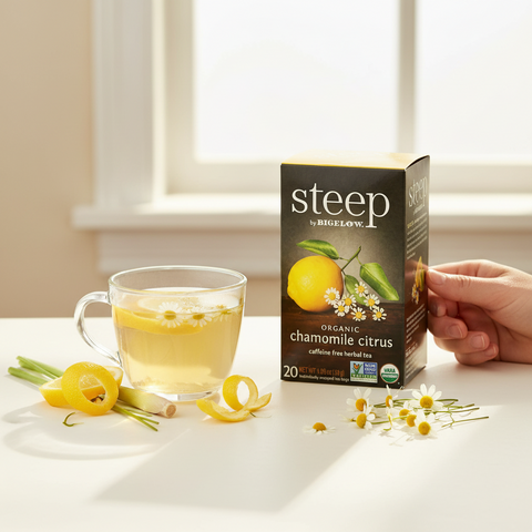 Bean Here Bean There Coffee & Cocoa Steep by Bigelow Organic Chamomile Citrus tea box with a cup of herbal tea